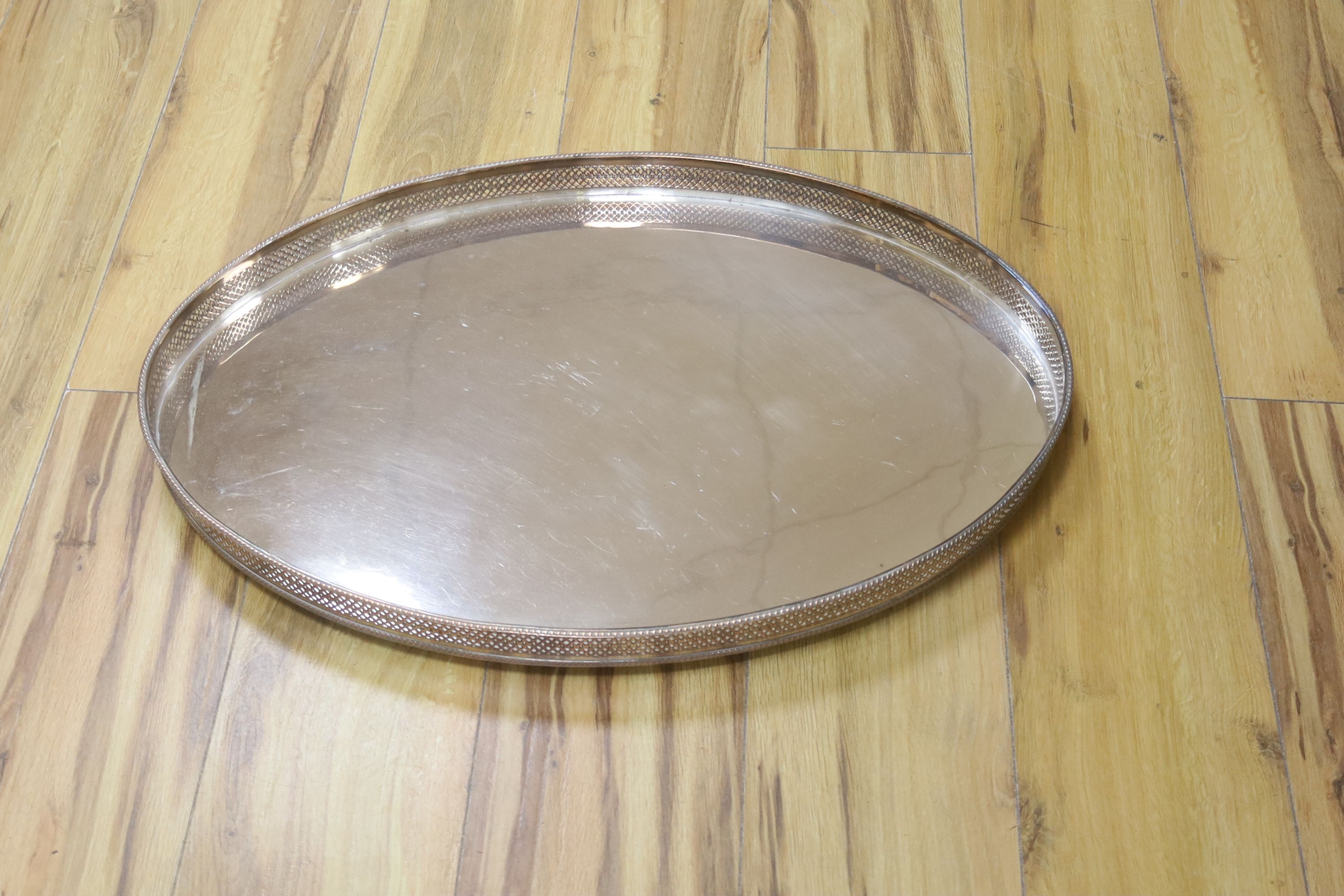 A silver plated oval gallery tray, width 61cm